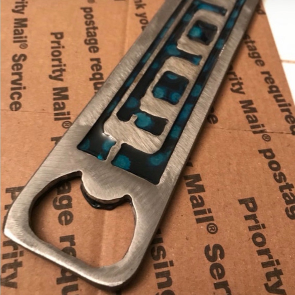 One of a Kind Tool 10,000 Days Metal Bottle Opener with Blue Accents